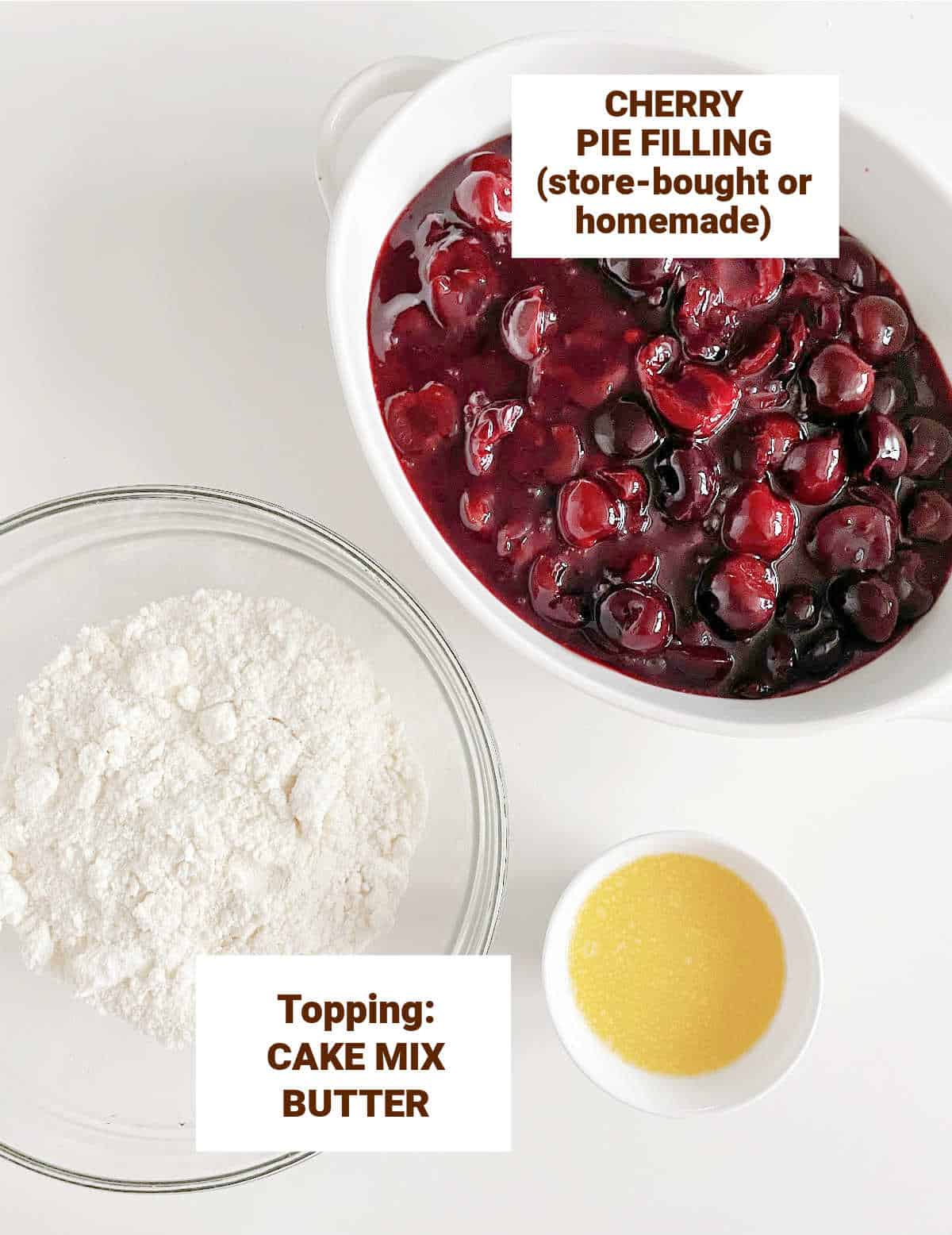 White surface with bowls containing ingredients for cherry dump cake including pie filling, butter, cake mix. Brown text overlay.