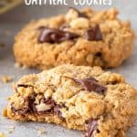 Close up of bitten and whole chocolate chip oatmeal cookies on grey surface; white text overlay.