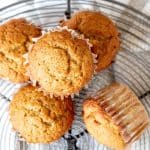 Top view of pumpkin banana muffins on a wire rack.