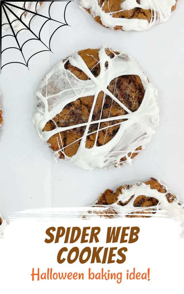 Chocolate cookie with marshmallow web on white paper. Brown and orange text overlay and graphic.