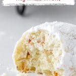 Close up of bitten snowball cookie on a white surface. Red and brown text overlay.