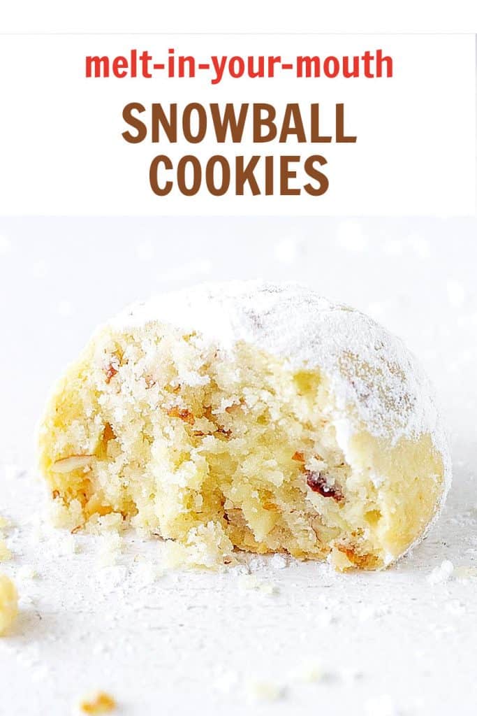 Eaten snowball cookie with powdered sugar on a white surface with brown and red text overlay.