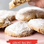 Brown and red text overlay over image of hand holding bitter pecan cookie over several others.