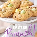 Purple and white text overlay on image of ceramic bunny plate with mini egg cookies.