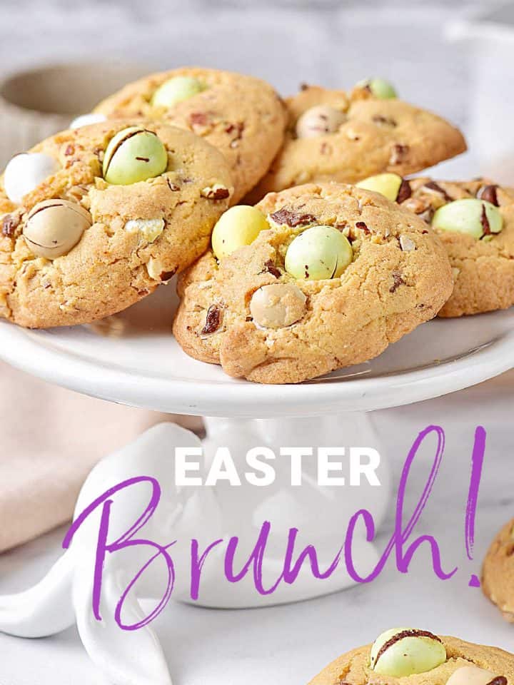Purple and white text overlay on image of ceramic bunny plate with mini egg cookies.