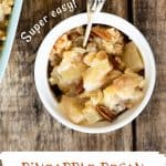 Orange and white text overlay on white bowl with pineapple pecan cobbler. Wooden surface.