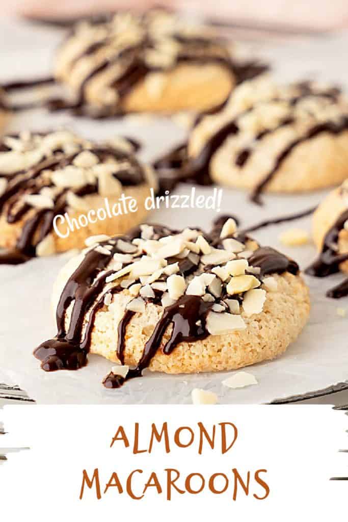 White and brown text overlay on close up image of chocolate-drizzled, almond topped macaroon cookies on white paper.