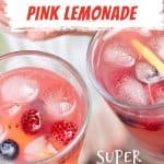 White and red text overlay on close up image of hands holding glasses of pink lemonade, ice cubes, and berries.