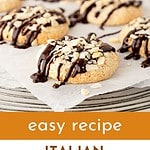 Brown and white text overlay on whole and bitten chocolate-drizzled almond cookies.
