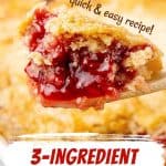Red and white text overlay on close up image of wooden spoon with cherry dump cake.