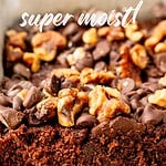 Brown and white text overlay on chocolate cake with walnut topping.