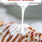 Drizzling powdered sugar glaze on a loaf cake. Red, yellow and white text overlay.
