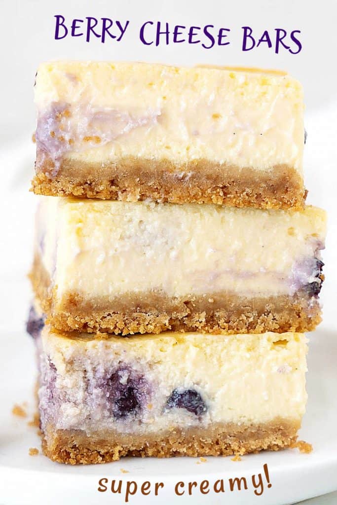 Close up of stack of three blueberry cheesecake bars with white background. Purple text overlay.