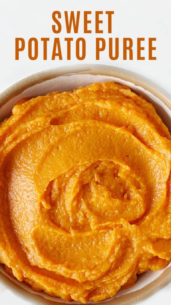 Close up sweet potato puree in a bowl with white background. Orange text overlay.