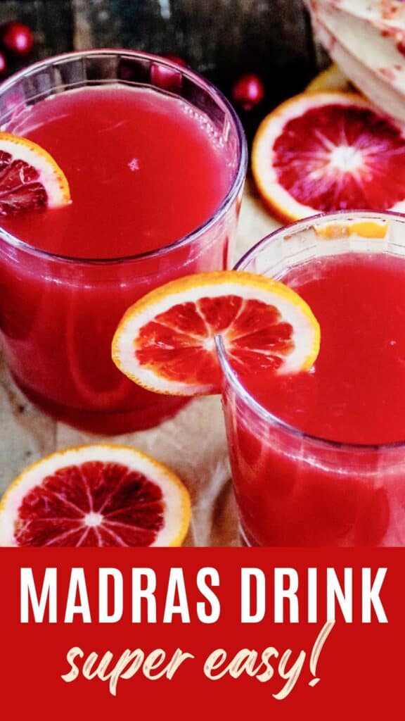 Red and white text overlay on two glasses of cranberry orange vodka drinks with orange slices.