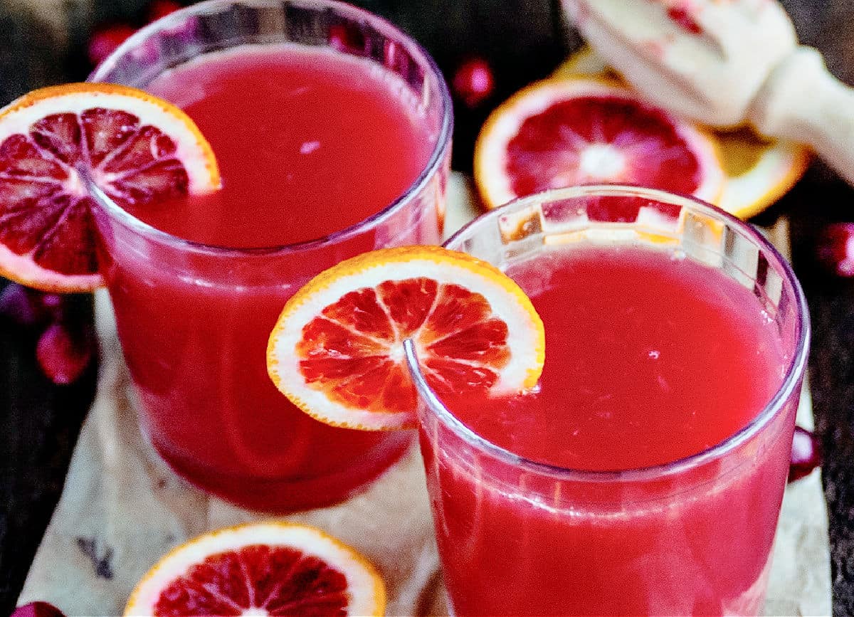 Short glasses with madras cocktail and blood orange slices.