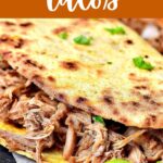 Brown and white text overlay on close up image of shredded pork tacos.