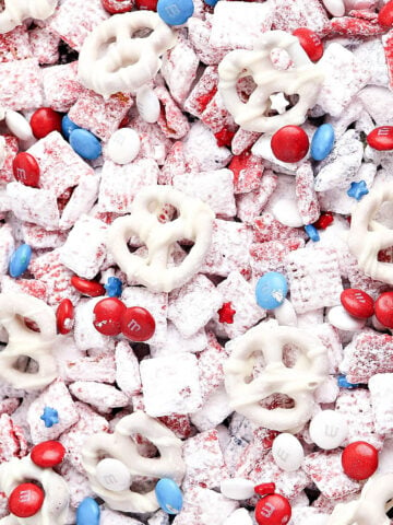 Easy red, white and blue homemade puppy chow with candies. Close up image.