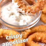 Brown and white text overlay on onion rings with bowl of white sauce.