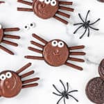 White marble with chocolate-covered Oreo spiders.