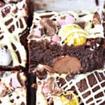 Chocolate mini egg brownies with chocolate drizzle. Close up.