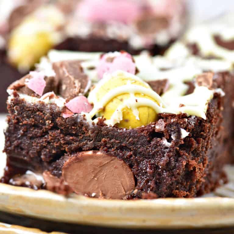 Beige plate with Easter mini egg double chocolate brownie.