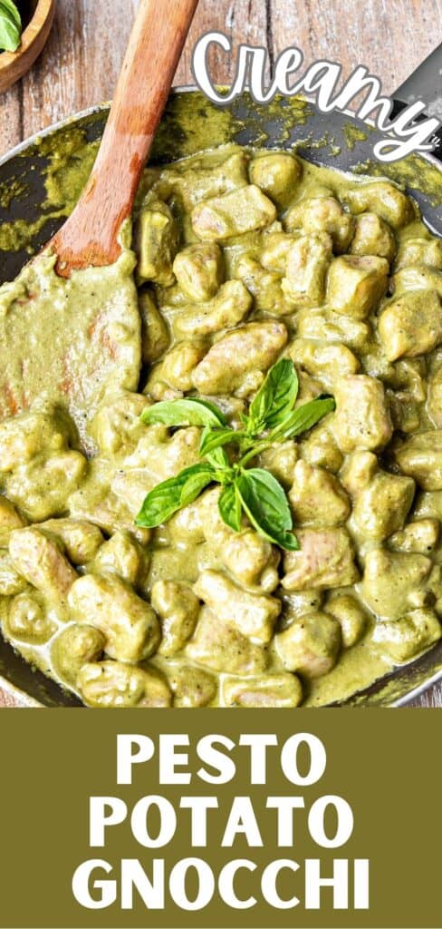 Green and white text overlay on skillet with pesto gnocchi.