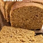 White text overlay on sliced rye bread sandwich loaf. White background.