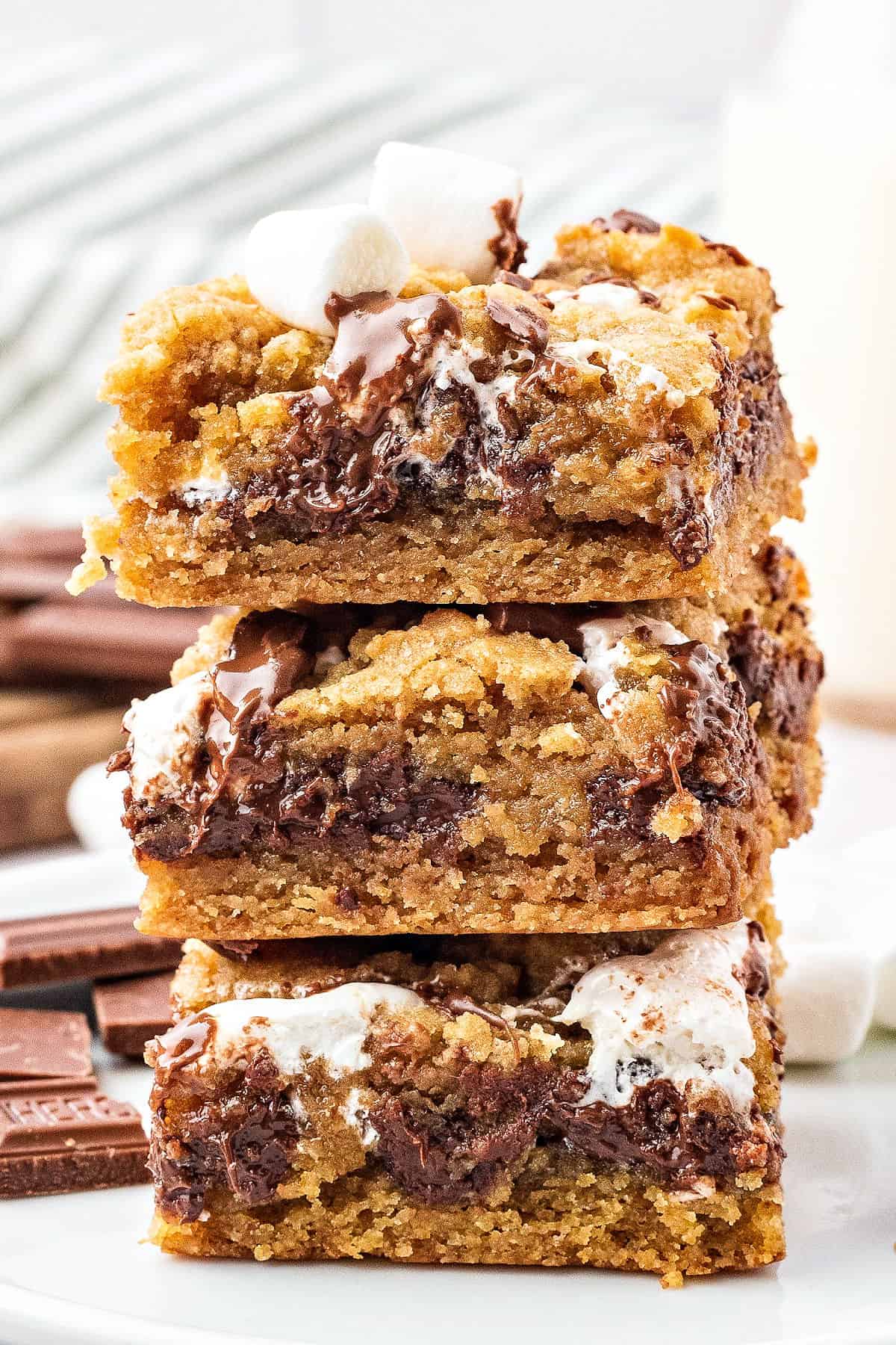 Stack of three s'mores bars. White background.