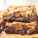Stack of two brookies on a wooden board. White background.