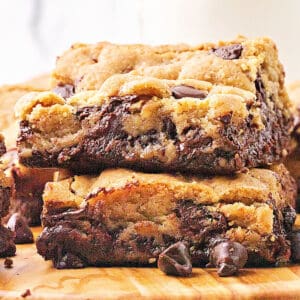 Stack of two brookies on a wooden board. White background.