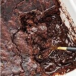 Self saucing chocolate pudding cake with brown, blue and white text overlay.