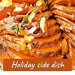 Text overlay on hasselback honey sweet potatoes with walnuts.