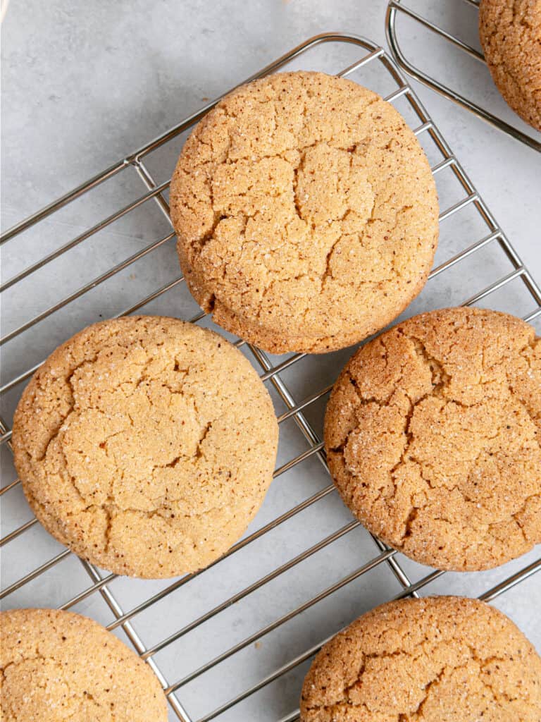 Metal racks with snickerdoodles. Light gray background.