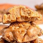 Bitten and whole pralines with orange and brown text overlay.